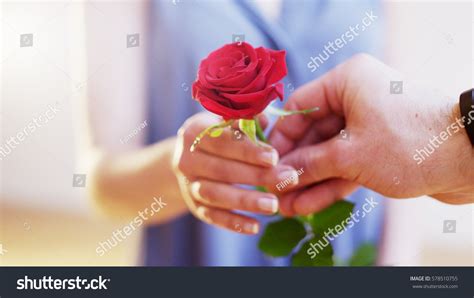 Man Gives Red Rose Woman Stock Photo Edit Now 578510755 Shutterstock