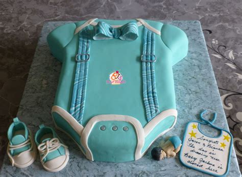 For me, with my other babies, i found an gown with an elastic casing on the bottom to be a little more practical. Bow Tie Onesie - CakeCentral.com