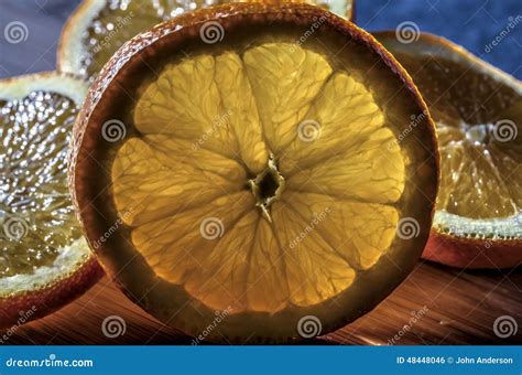 Sliced Oranges Stock Photo Image Of Sunlight Yellow 48448046