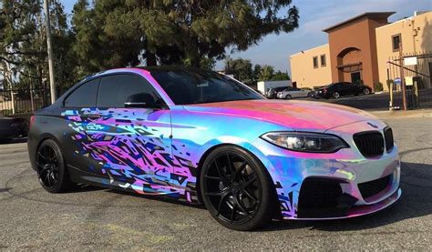 The wrap industry constantly strives to deliver new takes on the second skin concept and the appearance of this m car stands as a testament to this. BMW M235i with Rainbow Chrome Wrap