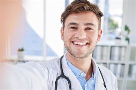 Premium Photo Happy Portrait Or Doctor Taking A Selfie For A Social Media Profile Picture In A
