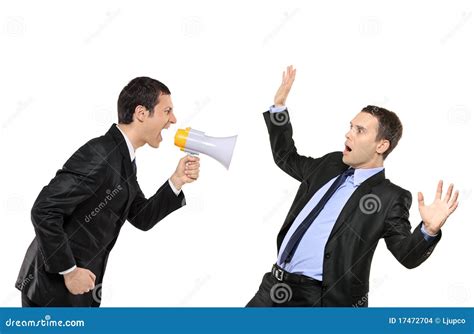 Angry Businessman Yelling Via Megaphone To A Man Stock Photo Image