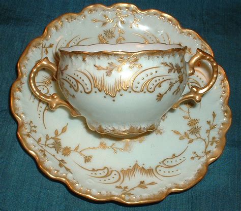 The most common gold handle cup material is porcelain & ceramic. C Antique LIMOGES France 2 Handles Cup & Saucer Fancy GOLD ...