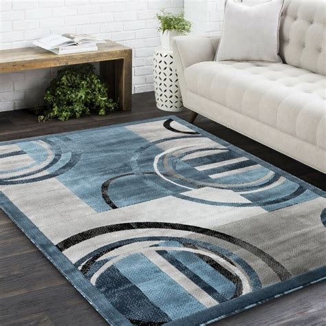 Deco rings light blue geometric modern casual 8 round (7'10'' round) area rug easy to clean stain fade resistant shed free abstract contemporary color block boxes lines soft living dining room rug. Orren Ellis Delana New Modern Blue/Grey/Ivory Area Rug ...