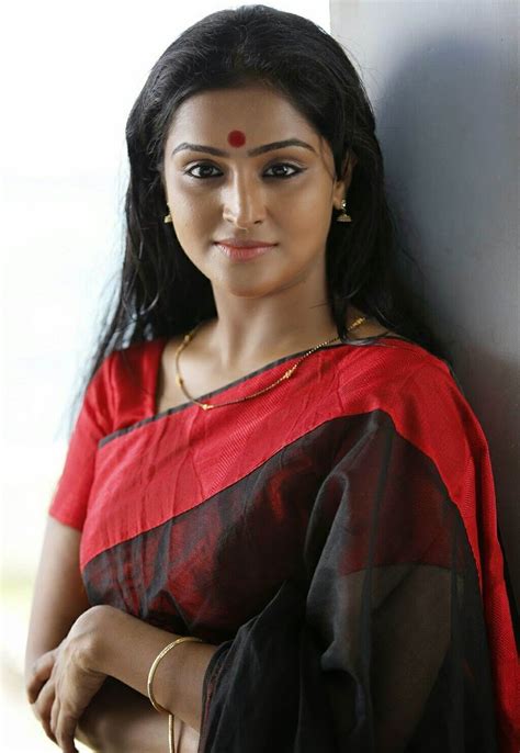 She had a short haircut with a black hair color. Actress Remya Nambeesan Long Hair In Black Saree - Actress ...