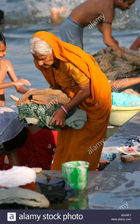 download this stock image rajasthani woman washing clothes at the bathing ghats at udaipur