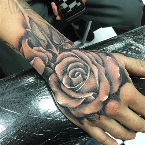47 Rose Hand Tattoos For Women