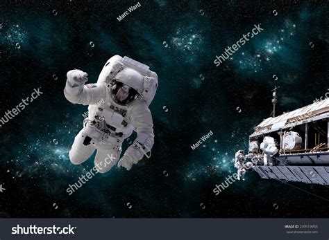 A Depiction Of An Astronaut Floating In Outer Space While His Fellow