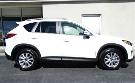 Matching floor carpets and *mazda unlimited refers only to an unlimited mileage warranty program under the terms of which. 2016 Mazda CX-5 White