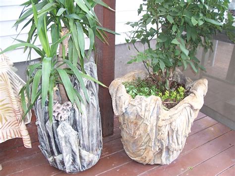 Cement art planters, layers of fabric draped... | Marie Zane | Flickr