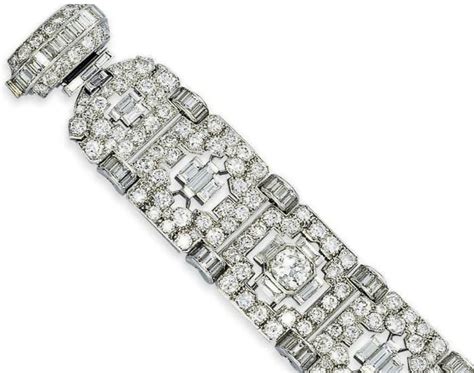 An Art Deco Diamond Bracelet By Van Cleef And Arpels Designed As Seven Openwork Panels Each With