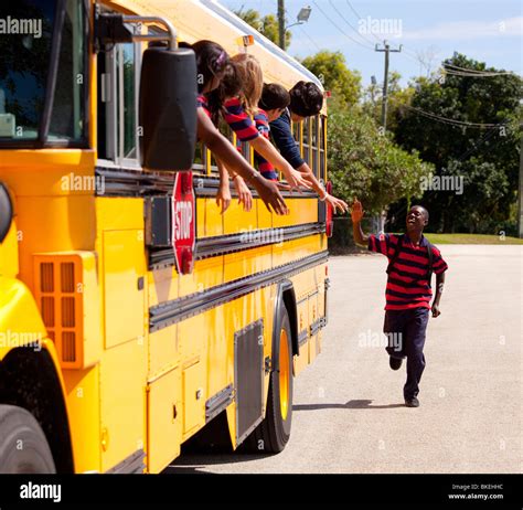 Student Running To Catch The School Bus Stock Photo 29209976 Alamy
