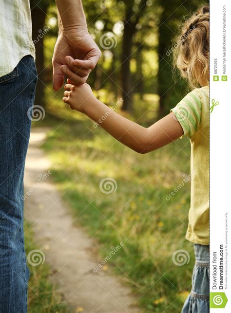 The Parent Holds The Hand Of A Small Child Stock Image Image Of Human