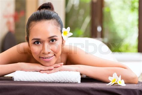 Indonesian Woman Having Wellness Massage Stock Image Colourbox