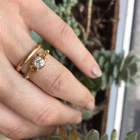 Find the latest designs and stunning collection of finger rings at tanishq. Vintage Victorian engagement ring paired with a 24k yellow gold wedding band | not like other ...