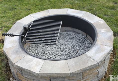 A fire pit can be a very versatile option, that can be used to cook outdoors in a range of different ways. diy-backyard-fire-pit-top-view - Her Tool Belt