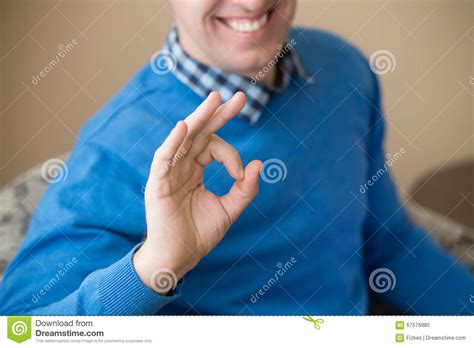 Young Man Gesturing Ok Sign Stock Image Image Of Blue Good 67576885