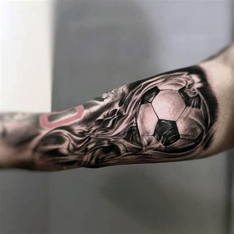 For those who support a particular player, they may use a banner style featuring names and dates, with the players' number emblazoned on a ball. 90 Soccer Tattoos For Men - Sporting Ink Design Ideas