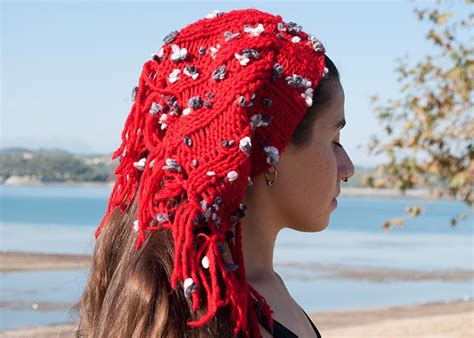 This is an incomplete list of headgear (that is, anything worn on the head), both modern and historical. Hand Knitted Red Cotton Headgear - ArcheaMystic