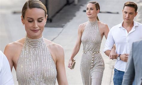 Brie Larson Turns Heads In A Sparkling Silver Jumpsuit With Her Boyfriend Elijah Allan Blitz