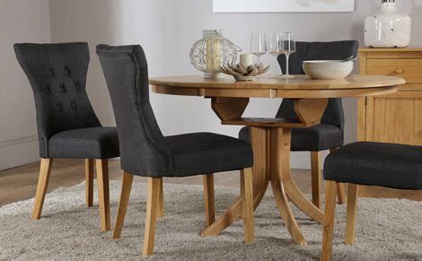 Find this pin and more on lounge by jo luckman. Hudson Round Extending Dining Table & 4 Chairs Set (Bewley ...