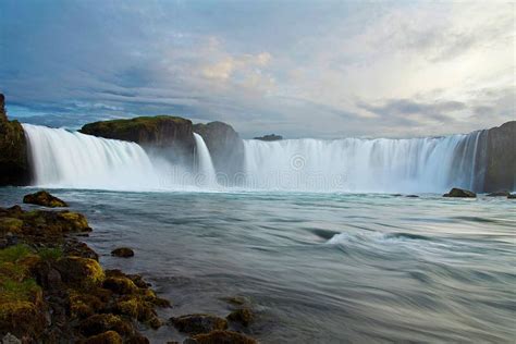 Scenic Long Exposure Shot Of The Godafoss Waterfall In Iceland Stock