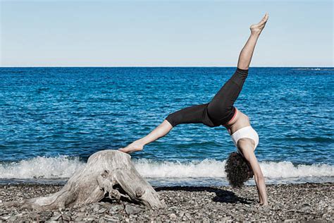 Yoga Bending Over Backwards Beach Women Stock Photos Pictures