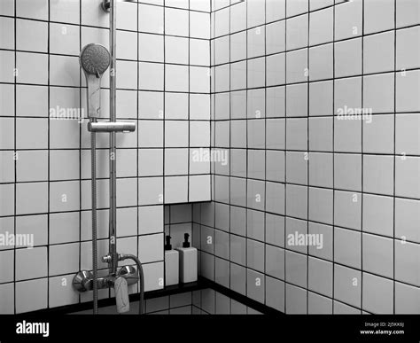 Chrome Shower Set On Black And White Grid Tiles Wall The Interior Of Modern Shower Room Space