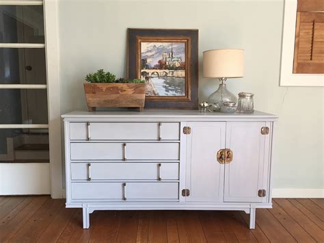 Make storage stylish with a modern credenza. Mid-Century Modern Buffet Painted in Paris Grey | Barnaclebutt