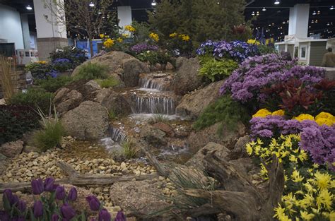 Moss Rock From Colorado Enhances This Beautiful Pondless Waterfall