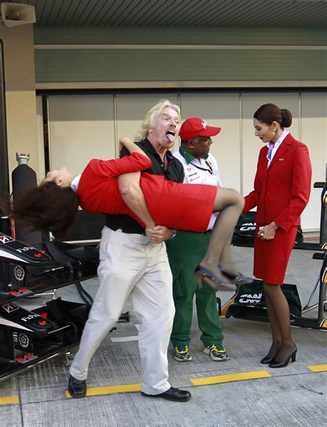 Sir Richard Branson Carries A Virgin Stewardess ~ World Stewardess Crews