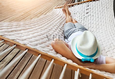 夏日吊床上的男人照片摄影图片id132770091 Veer图库