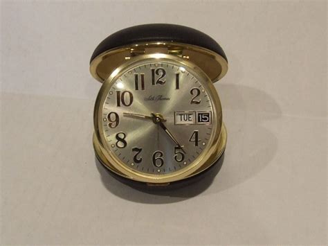 Vintage alarm clock sales on the web since 1996. Travel Alarm Clock, Seth Thomas, Round Black Clock ...