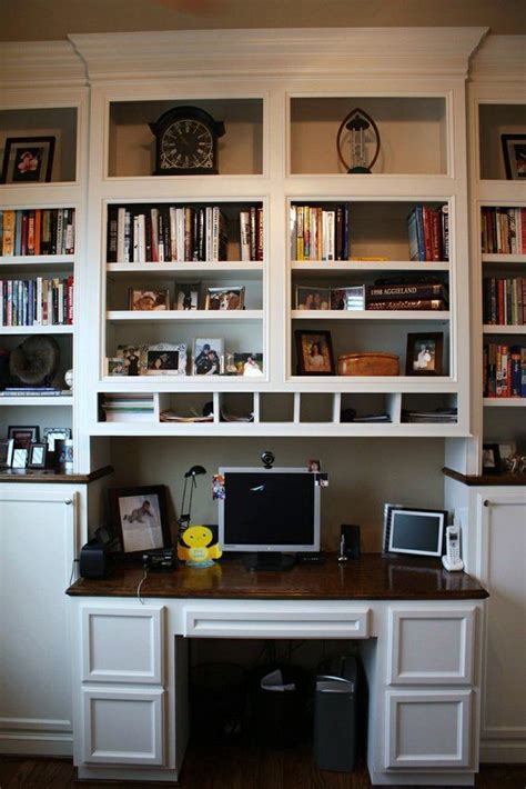 It gives you global control of clutter, and a place for everything you need to work, from no. built in bookshelves with built-in desk that protrudes out ...