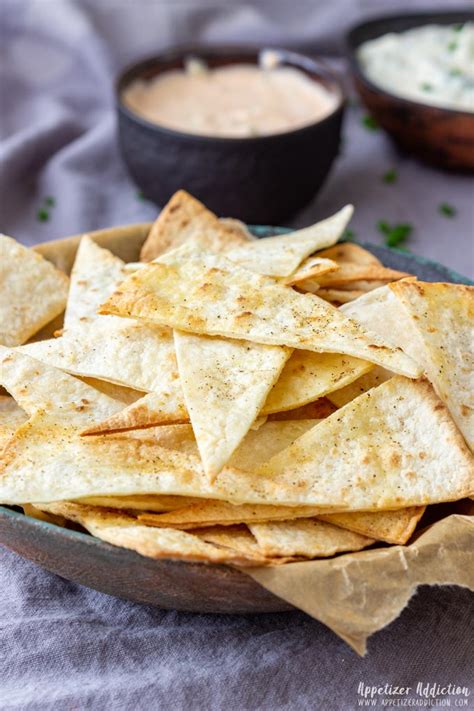 The tortilla chips will fry better if they are a bit dried out first. Oven Baked Tortilla Chips - Appetizer Addiction