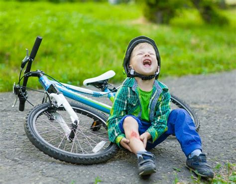 Boy Fell From The Bike In A Park Stock Photo Image Of Crash Hurt