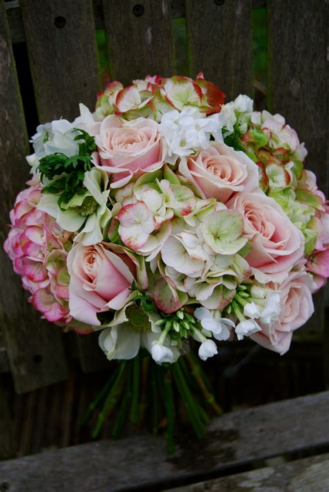 Round Pastel Pink And Green Bouquet With Sweet Avalanche