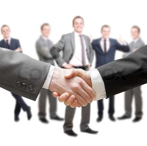 Businessmen In A Group And A Handshake Stock Image Colourbox