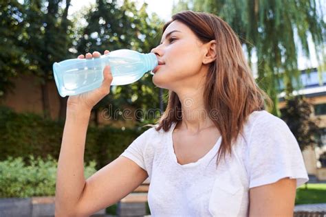 Girl Drinking Water After Workout Stock Photo Image Of Millennial
