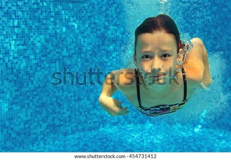 Child Swims Pool Underwater Happy Active Stock Photo 454731412