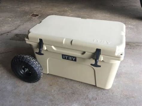 I bought an rtic 65 ice chest for camping and it works great, but it is way too heavy when loaded up with ice and stuff. Chilly Wheelies - Wheel Kit for RTIC 65