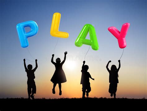 Children Holding Balloons With Word Play Stock Photo Image Of Playful