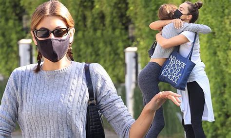 Kaia Gerber Shows Off Her Toned Midriff And Hugs A Female Friend After