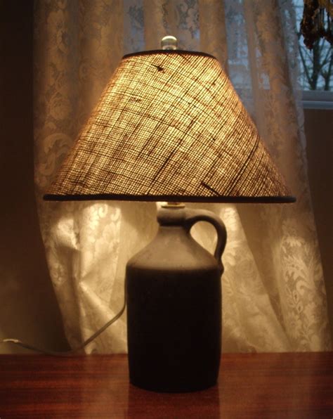 Maybe you would like to learn more about one of these? Burlap Lampshade for Antique Jug Lamp Base