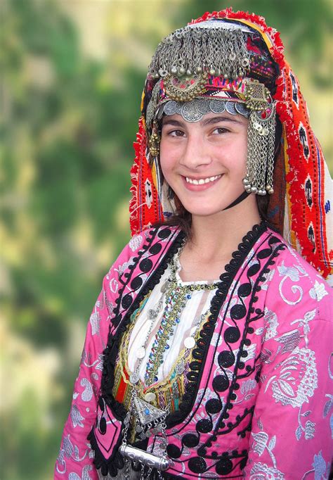 a turkish folk dancer in a festive dress turkish clothing folk clothing traditional outfits