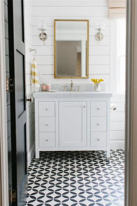 The truth is that such a bathroom looks quite futuristic due to the tiles on the walls, besides the abstract shaped mirror adds up to the. White Bathroom with Yellow Accents - Transitional - Bathroom