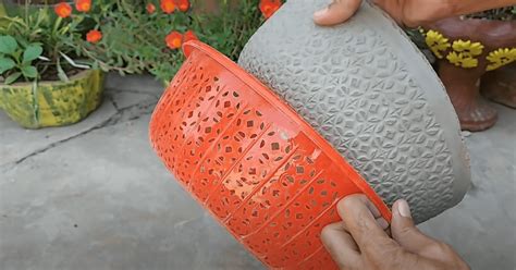 Gardener shows how to make cement flower pots with common household items