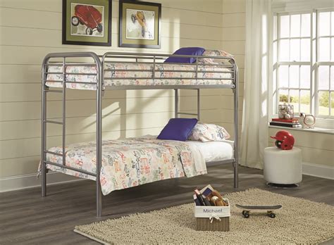 Decide if you want a trundle bed frame with a spring, to slide one twin bed under another, saving you space in a smaller room. American Freight 235-TT - Twin Over Twin Silver Metal Bunk ...
