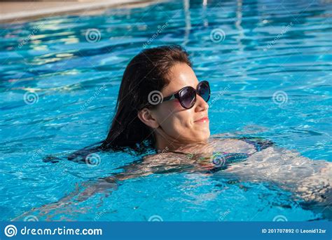 Beautiful Young Woman At Swimming Pool Stock Photo Image Of Resting