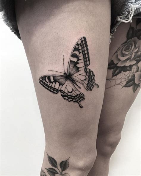 Black Ink Butterfly On Girls Thigh Best Tattoo Design Ideas